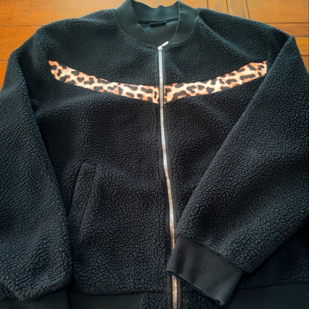 Fluffy and cozy! Black fleece zip front jacket.